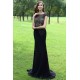 Společenské překrásné černé úzké šaty s tylovým průsvitným kamínky hojně zdobeným topem
