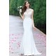 Svatební bílé překrásné úzké šaty s krajkovým živůtkem a svůdně průsvitnými zády