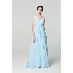Společenské dlouhé jednoduché blankytně modré nádherné šaty s kamínkovým páskem a volánkem na zádech