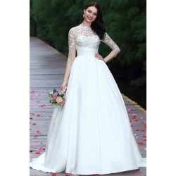 Svatební překrásné bílé dlouhé šaty s kamínky zdobeným topem, dlouhým rukávem a objemnou sukýnkou