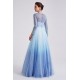 Plesové velice ojedinělé překrásné blankytně modré šaty z jemné látky s lesklým potiskem a dlouhým rukávem